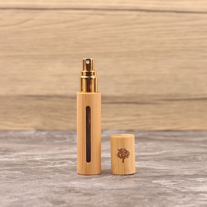 10ml spray bottle (tree of life); bamboo + glass + anodized aluminum nozzle